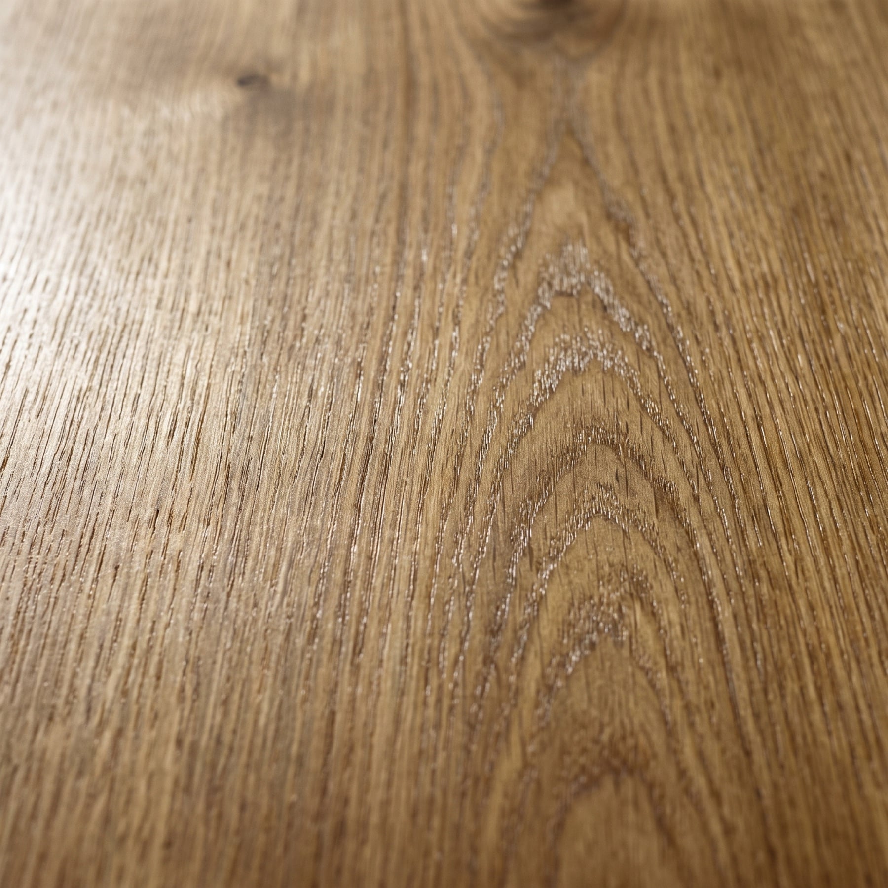 Close-up of natural oak with straight grain and a hand-oiled finish