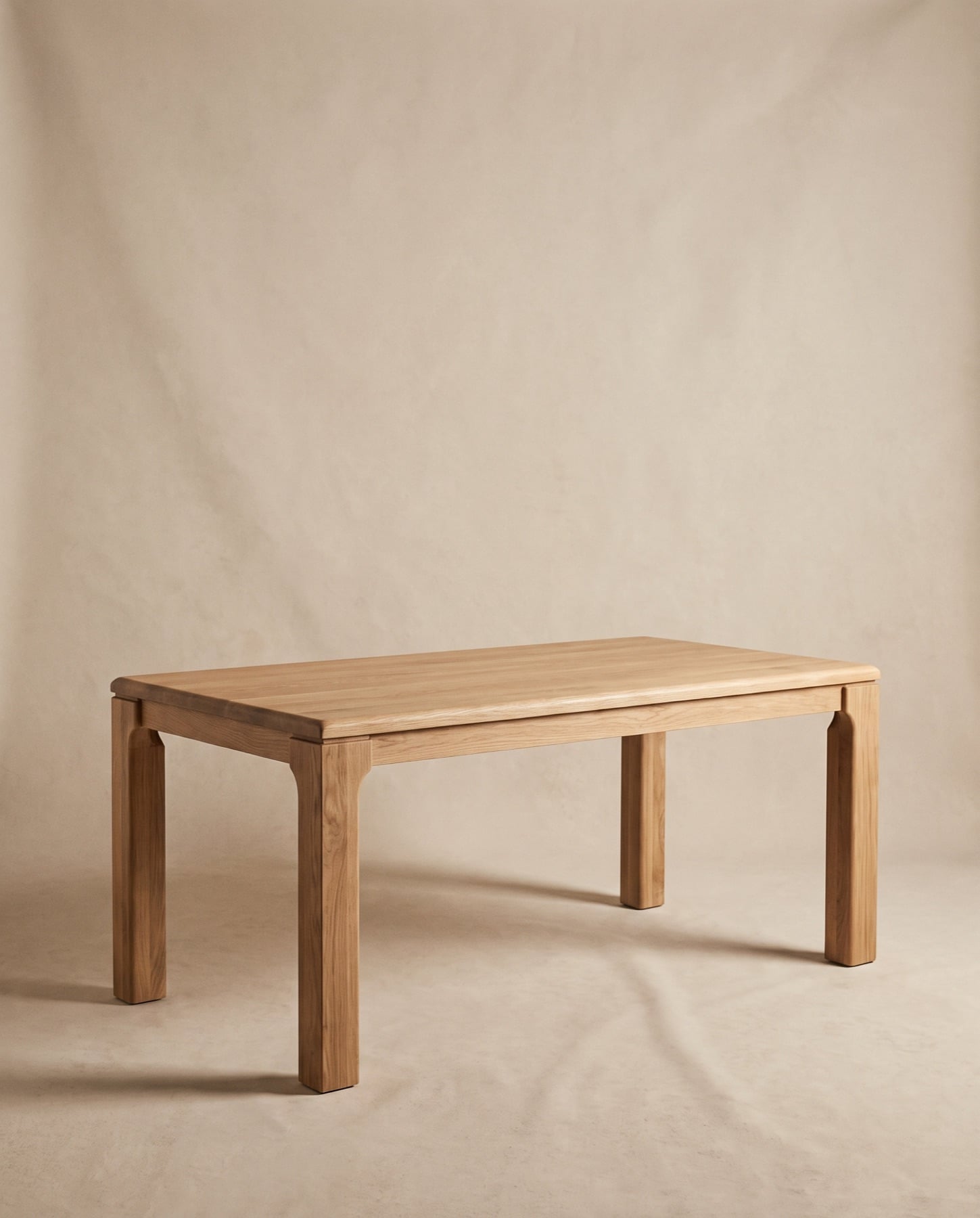 Halden rectangular dining table in solid oak with deep, softly radiused legs